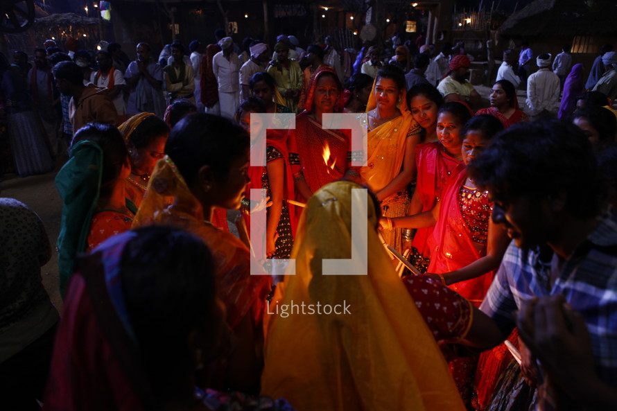 gathering at a night festival in India 