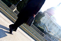 Politician and businessman walking on a sidewalk in Washington DC 