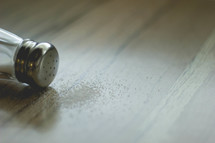 spilt salt from a salt shaker 