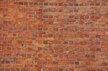 Baked clay red brick wall