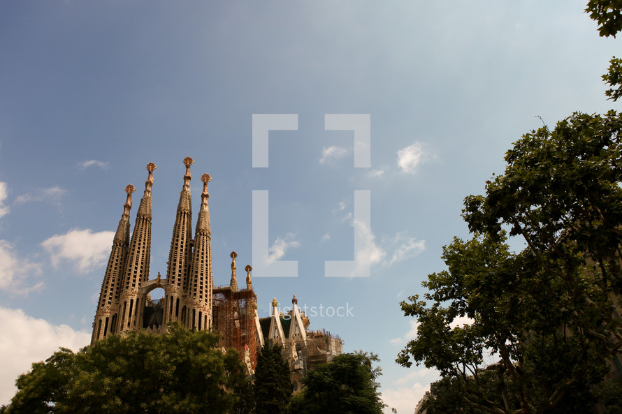 The Basílica i Temple Expiatori de la Sagrada Família, commonly known as the Sagrada Família, is a large Roman Catholic church in Barcelona, Spain, designed by Catalan architect Antoni Gaudí.