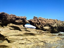 large rocks on an ocean shore