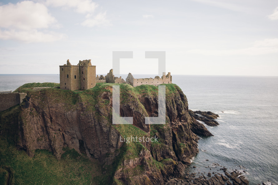 A Castle along a shore in Scotland 
