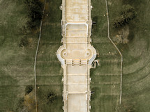 aerial view over a concrete walkway and grass