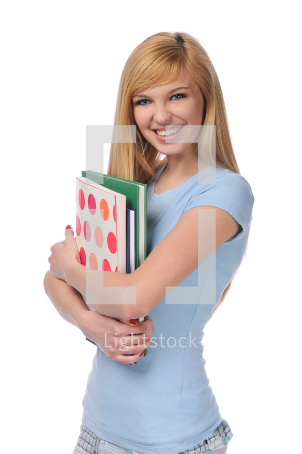 college student holding books 