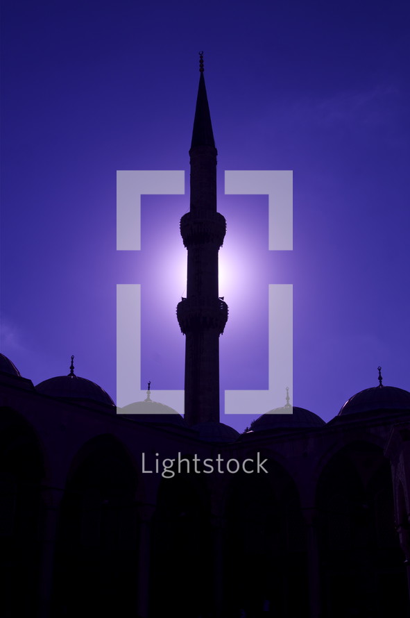 Moonlit minaret at a Muslim mosque. 