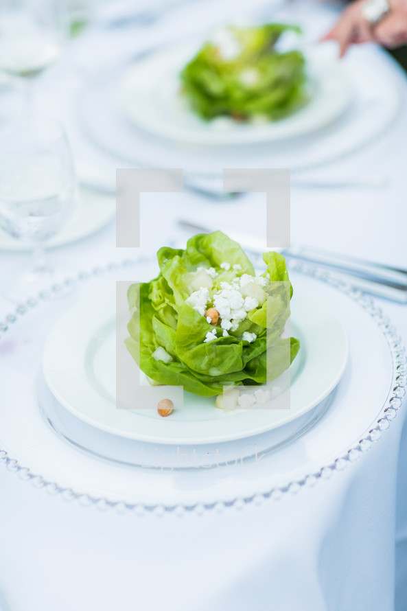 Lettuce and fetta plate salad, place setting, dinner, event, party, serving, saucer, charger
