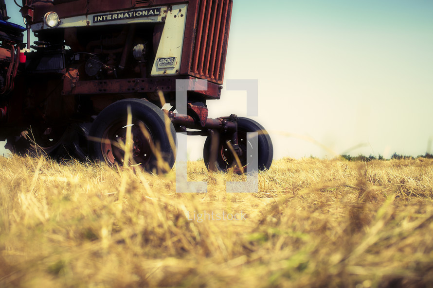 A red tractor in a field