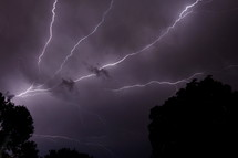 lightning in a sky at night 