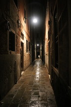 narrow alley at night in Venice 