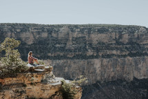 woman looking out over a canyon