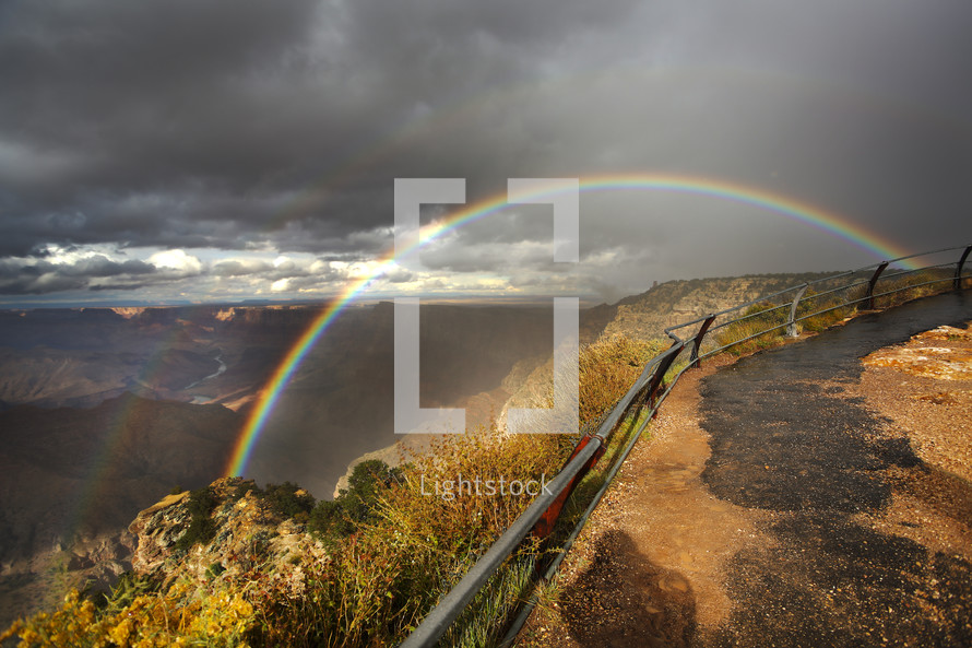 Rainbow along a canyon ridge.