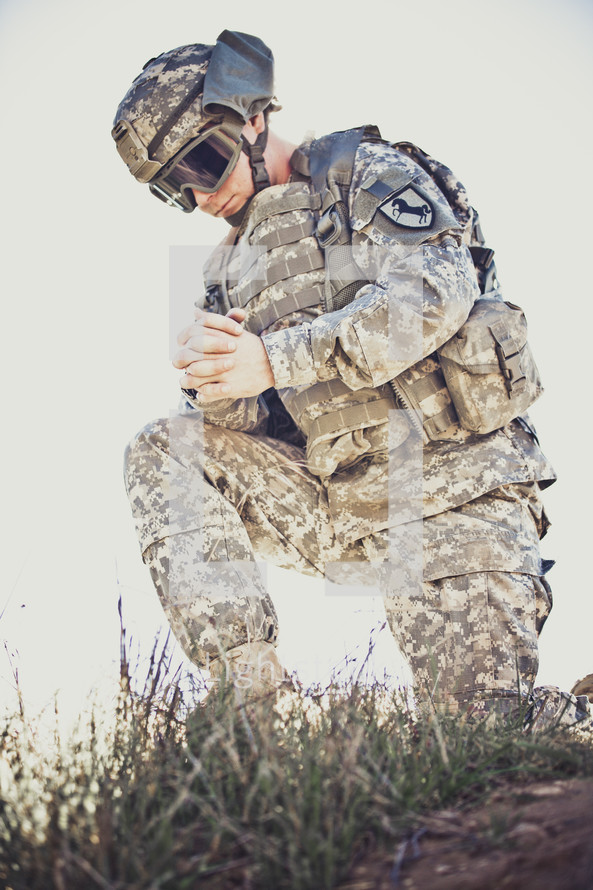soldier in prayer