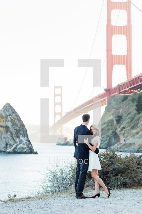 Couple by Golden Gate Bridge