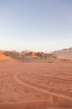 tracks in desert sands 