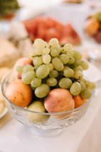 grapes and fruit in a bowl 