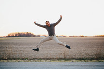 excited man jumping for joy 