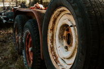 Close up of a rusty old tractor tire.