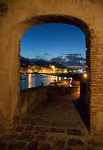 archway of bay by night of Ischia island, Italy