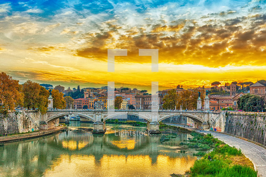 Bridge of Vittorio Emmanuel II on Tiber River and St.Peter's Basilica, Rome Italy.