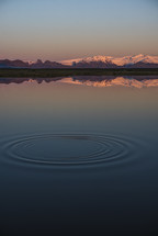 ripple in the water and mountain view 