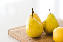 pears on a cutting board 