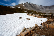 Snow ridge on mountainside,