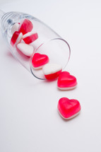 Candy hearts and champagne glass