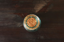 mustard seeds in a jar 
