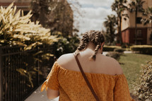 a woman with braided pigtails 