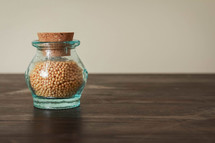 mustard seeds in a jar 