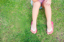 flip flops in the grass