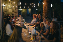 people gathered at a dinner party 