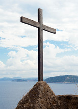 Wooden crucifix in the Aragonese Castle sheer above the sea