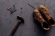 hammer, nails, and old leather shoes 
