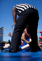 Referee at wrestling match