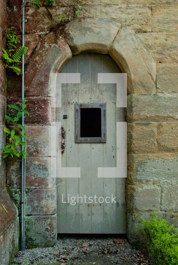 door in an arched doorway