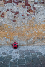 soccer ball on a sidewalk