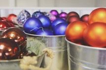Christmas ornaments in buckets