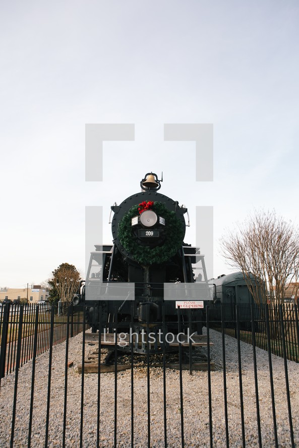 A train engine decorated for Christmas 