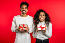 Young African American Couple With Valentines gifts