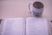 quiet time coffee mug and open Bible 