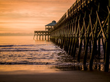 pier and tide at sunset 