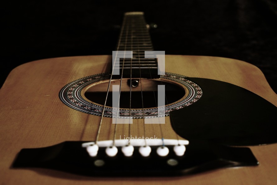 an acoustic guitar 