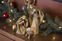 Wooden Nativity Scene with Garland