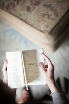 reading from a journal at a Bible study 