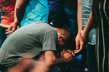 a man kneeling prayer 
