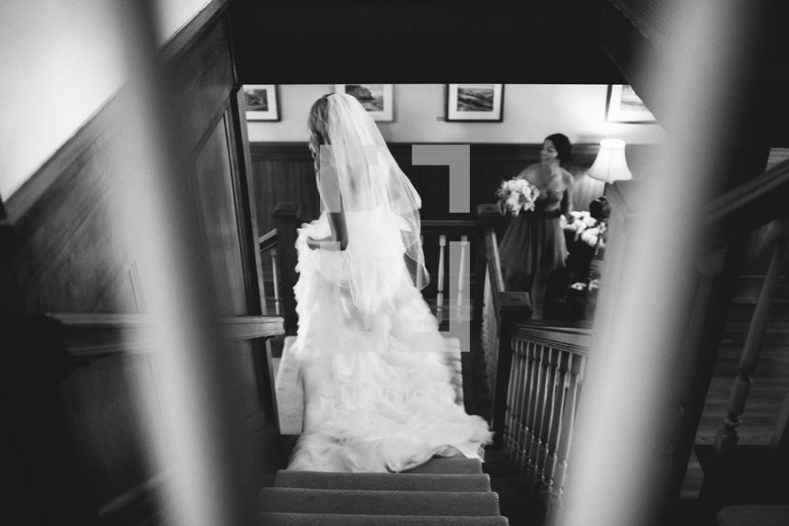 bride walking down a staircase