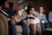 young adult Bible study on a couch 
