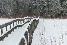 footbridge covered in snow 